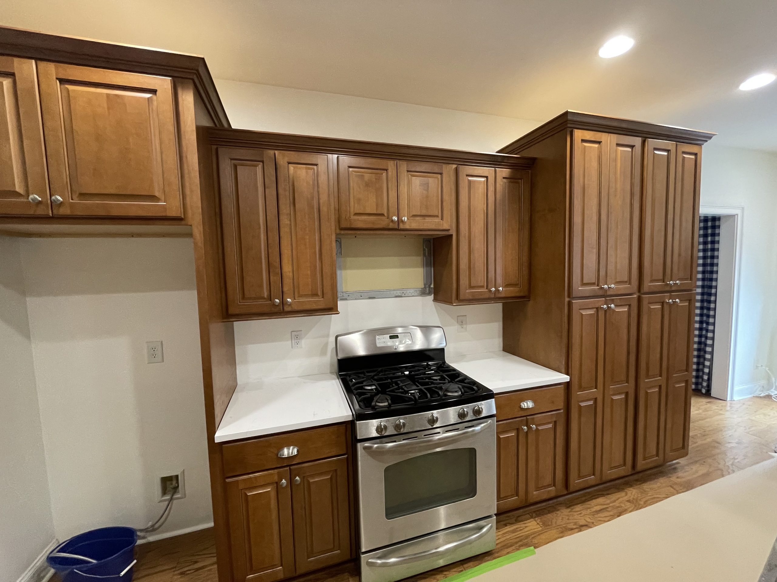 Kitchen Cabinets in Tyrone, GA, before kitchen cabinet painting project by CertaPro Painters of Peachtree City/Coweta County, GA
