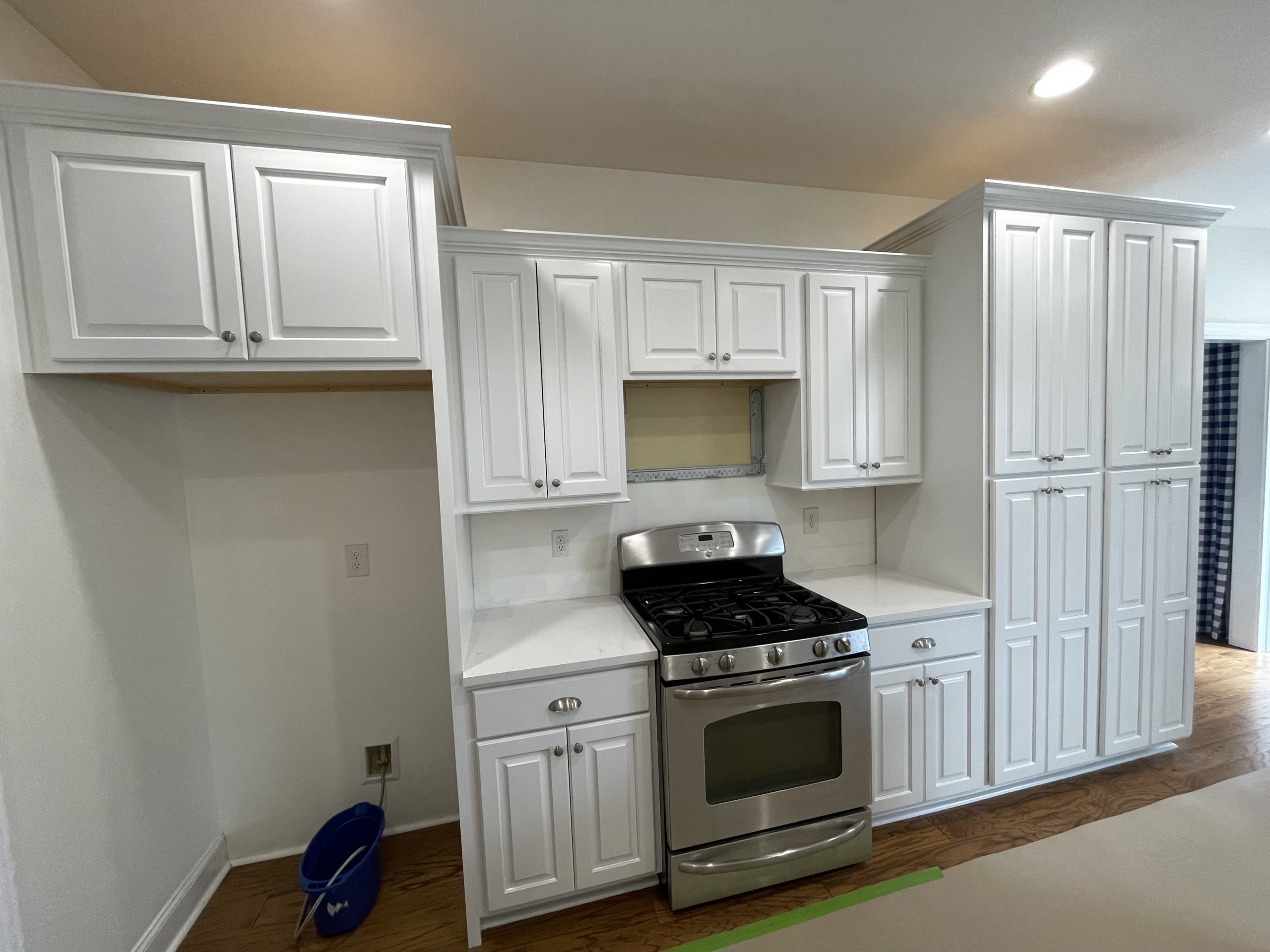 Kitchen Cabinets in Tyrone, GA, after completed kitchen cabinet painting project by CertaPro Painters of Peachtree City/Coweta County, GA