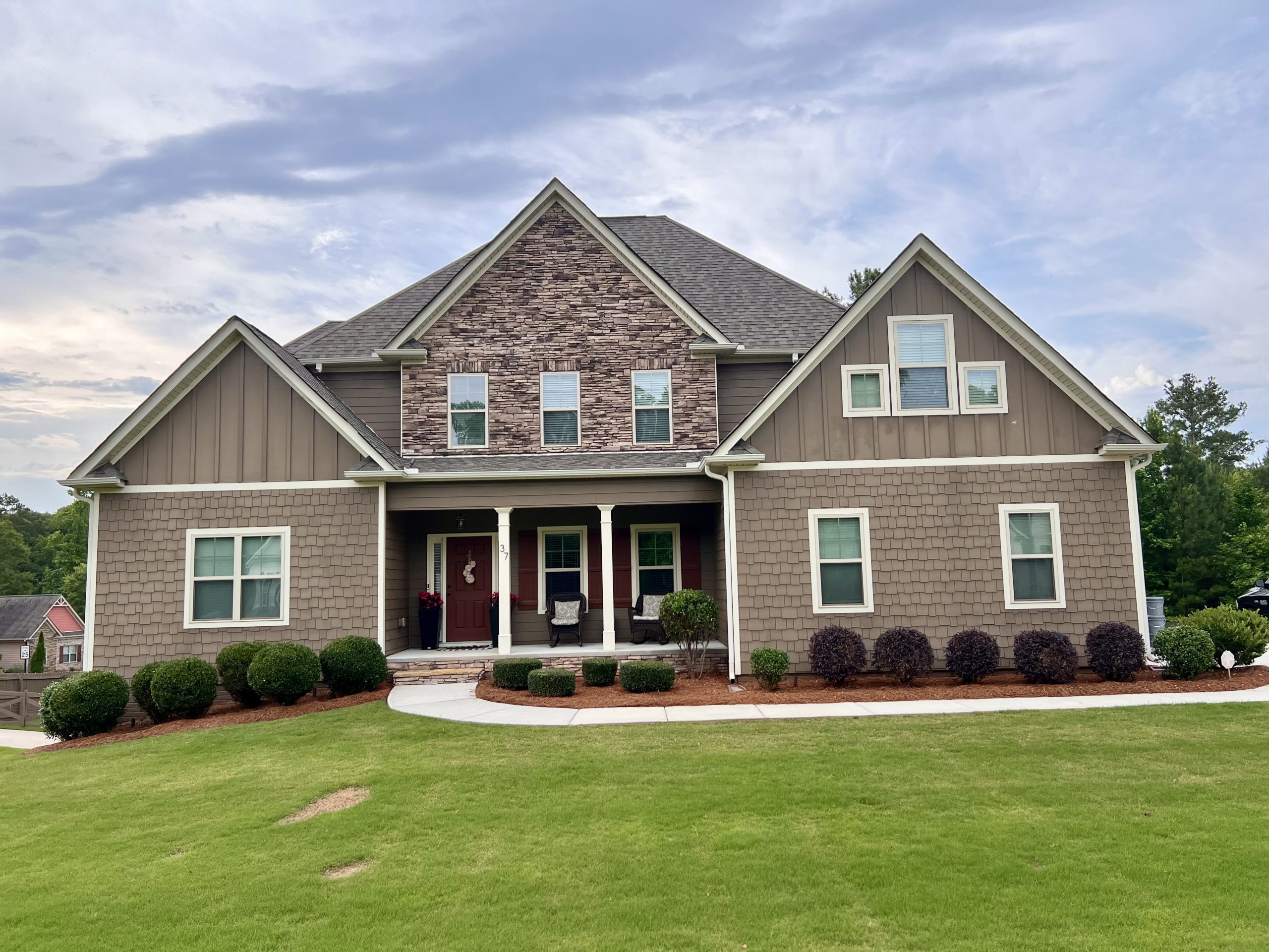 Front of brown home in Senoia before painting project