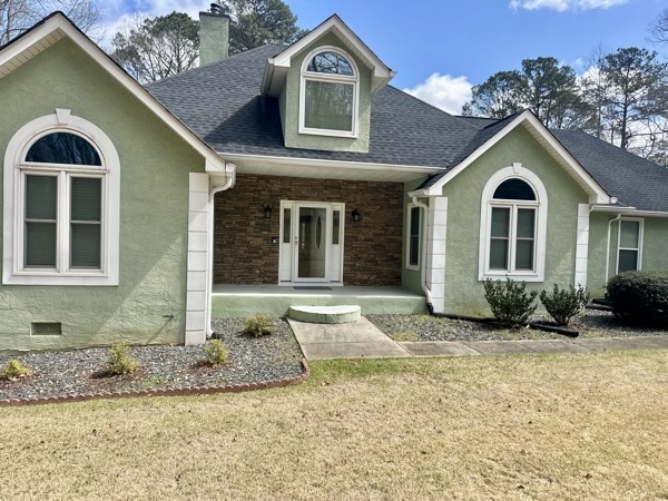 home exterior before being repainted