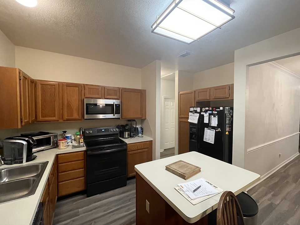 kitchen after wallpaper removal and painting
