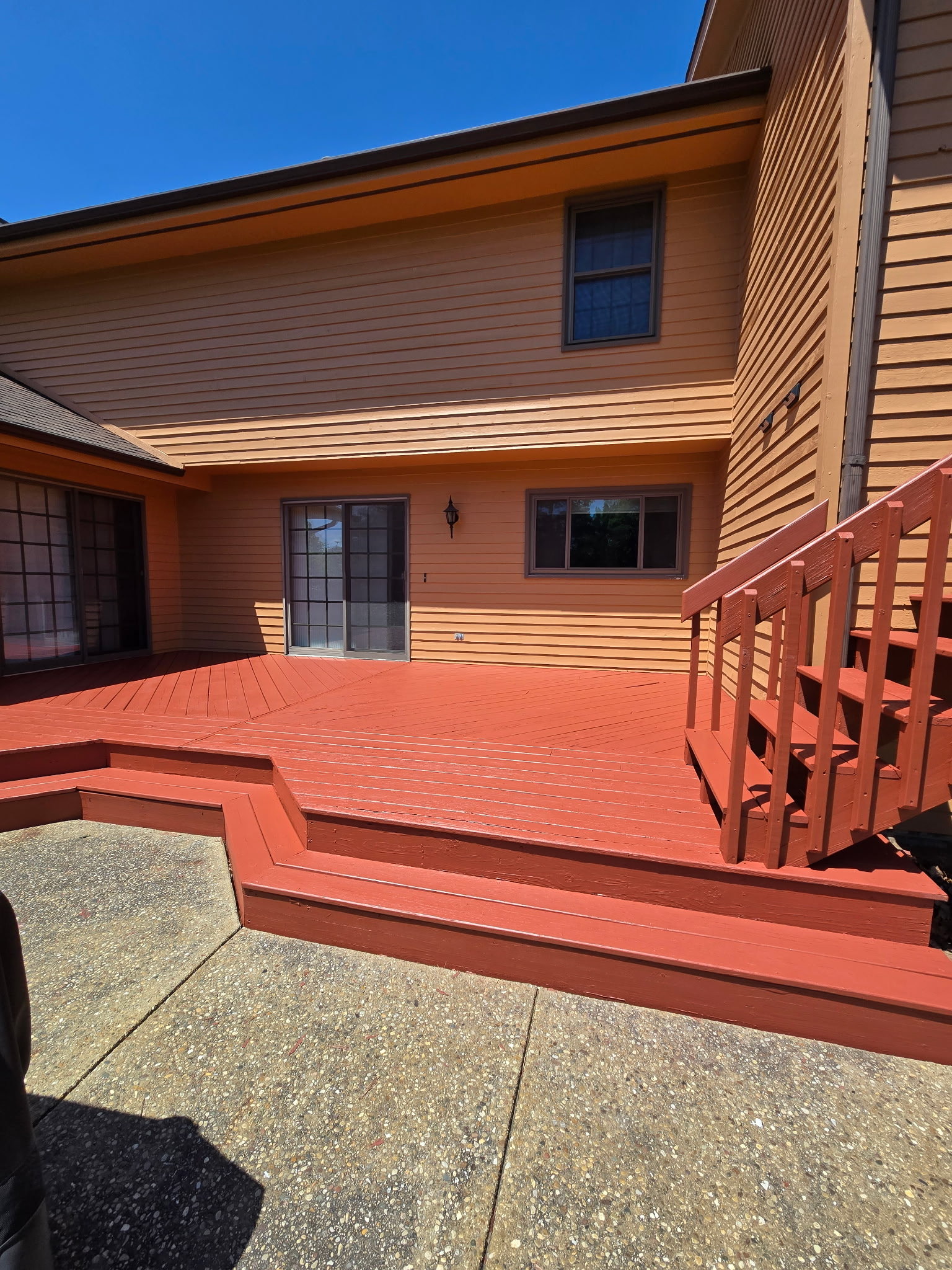 red stained wooden deck