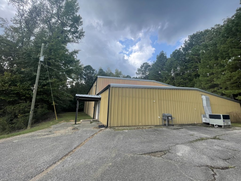 Commercial Exterior Metal Siding Painting Before & After Before