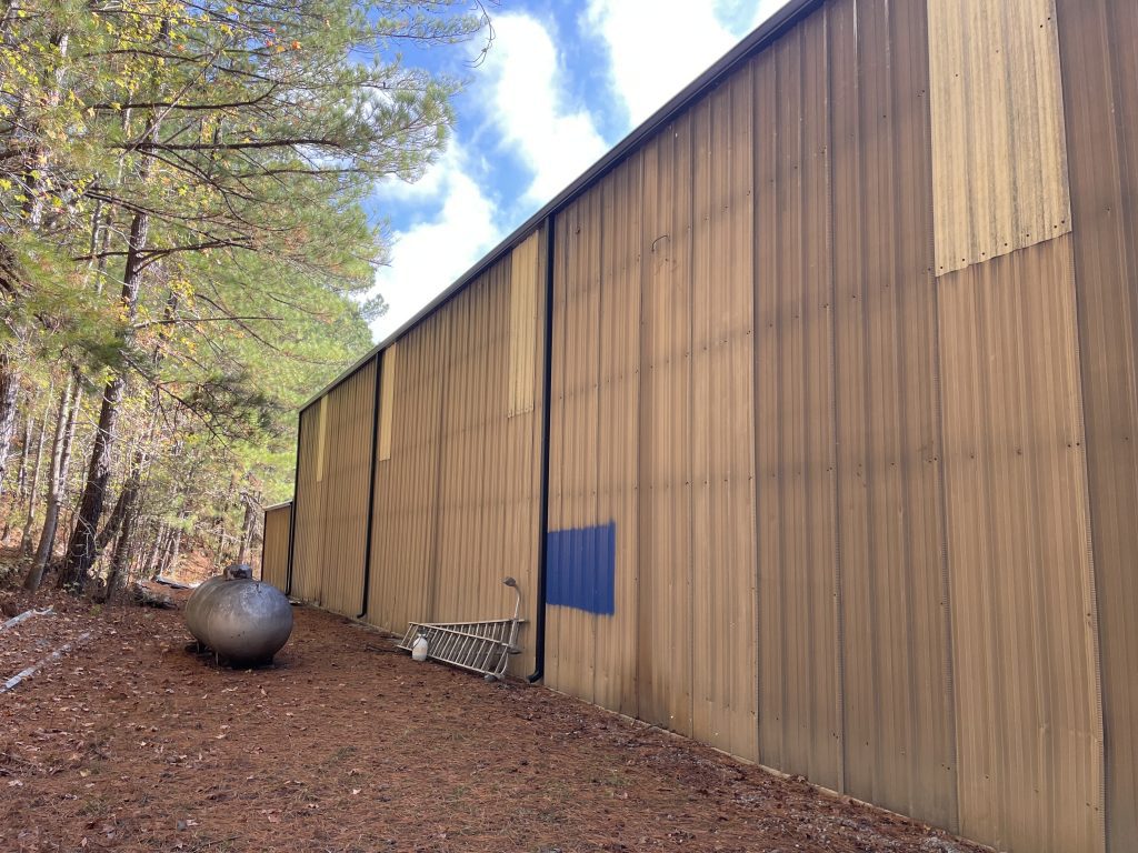 Commercial Exterior Metal Siding Painting Before & After Before