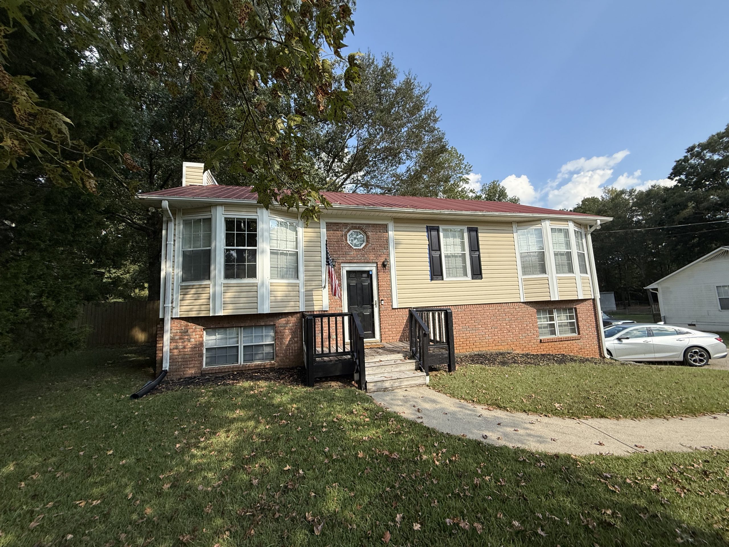 Springville Exterior Metal Roof and Vinyl Siding Painting Before & After Before