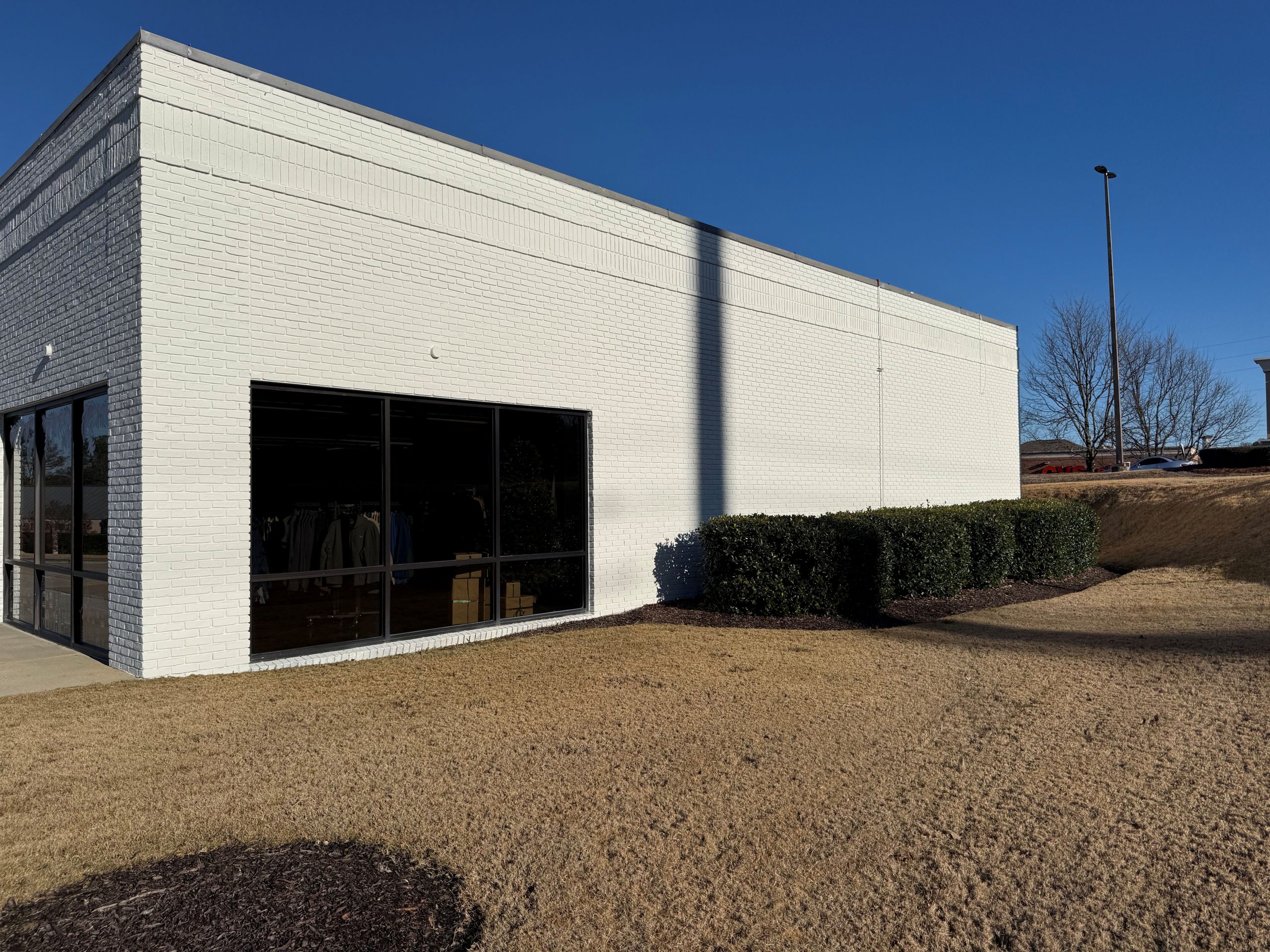 Inverness Commercial Exterior Brick Painting Before & After After