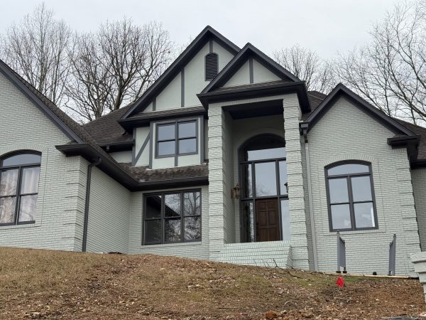 exterior of brick home in greystone after painting