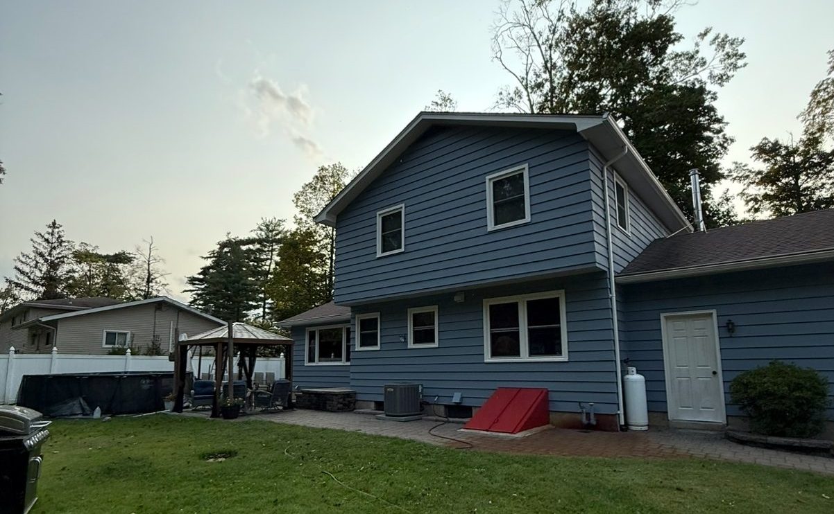 blue vinyl siding on house