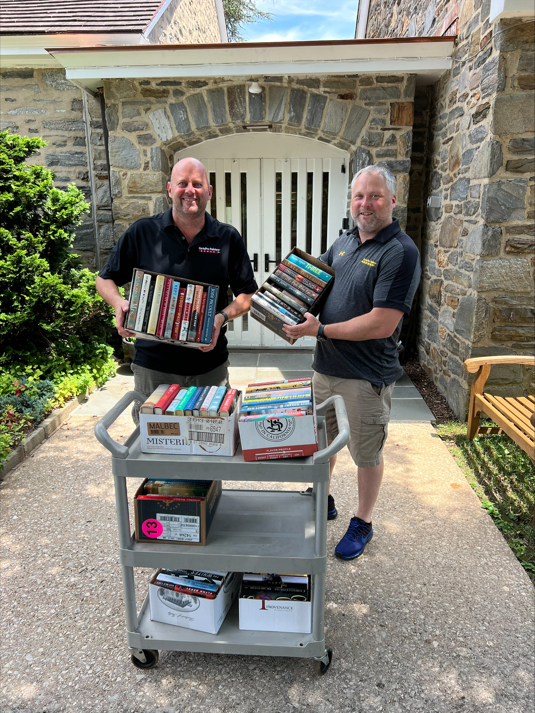 Brian and Chris collecting books