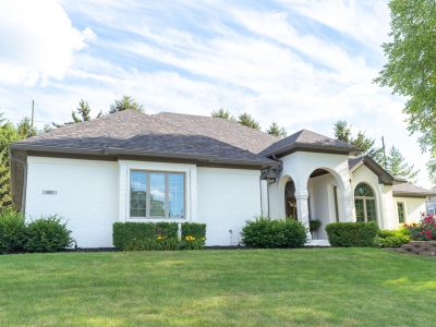 brick house painted white