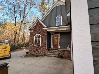 blue painted house exterior with white trim