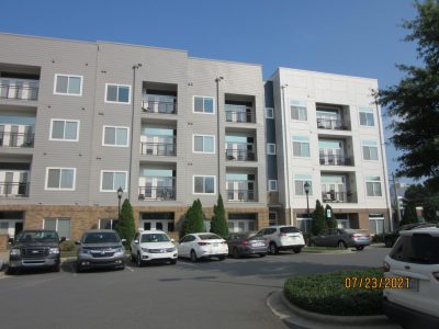 New Exterior Apartment Painting with gray and white