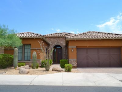 A burnt orange stucco home in Arizona.