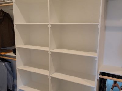 white painted closet shelves