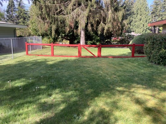 red painted fence