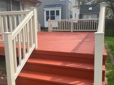 Deck Painting Refreshed with red paint