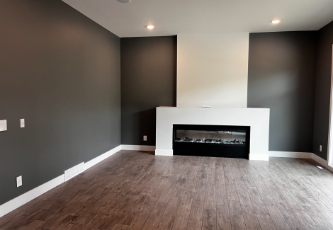 Medicine Hat, AB Residential Interior Living Room with Fireplace Paint Job