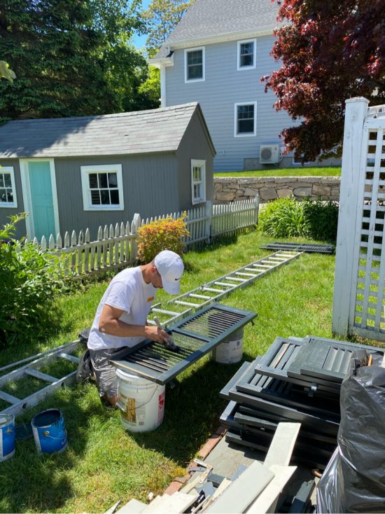 certapro painters on lawn during paint job