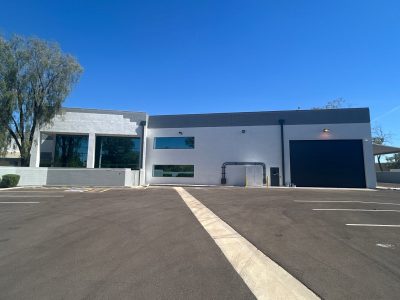 white and grey painted brick commercial building exterior