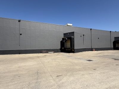 dark painted warehouse exterior