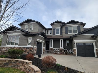 home exterior after siding and trim repaint