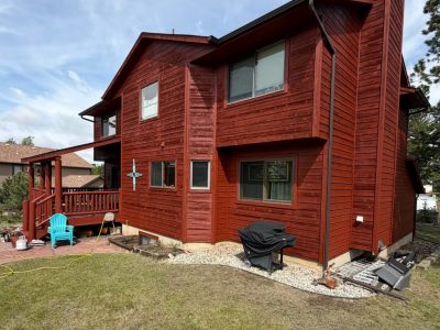 dark red stained cabin style house exterior
