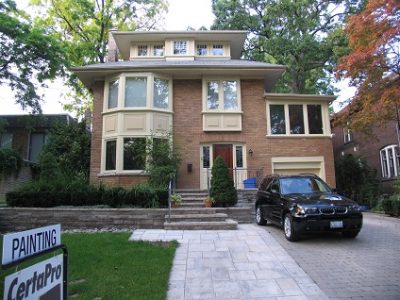Exterior painting by CertaPro house painters in Rosedale and Moore Park
