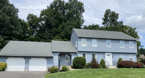 After the vinyl siding was painted.