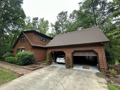 exterior of house with wood siding after stain