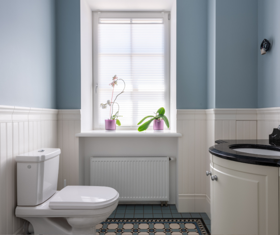 small white and light blue powder room