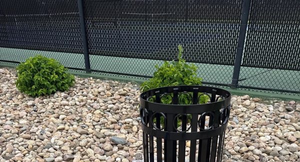 black painted trash receptacle