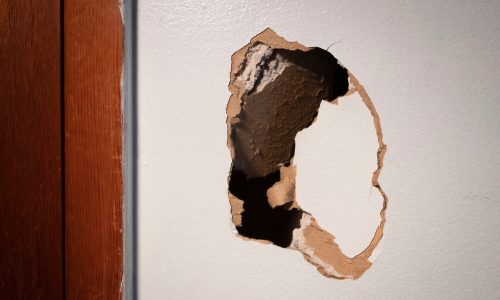 Large,Hole,In,Damaged,Drywall,,In,Need,Of,Repair