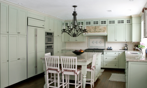 Light mint green cabinets is unexpected but still classic.