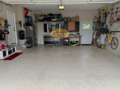home garage with coated floor