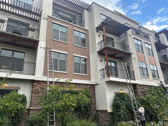 commercial building exterior during repaint