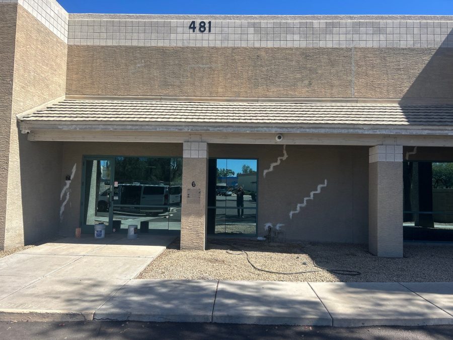 commercial building exterior with worn brick before repaint Preview Image 4