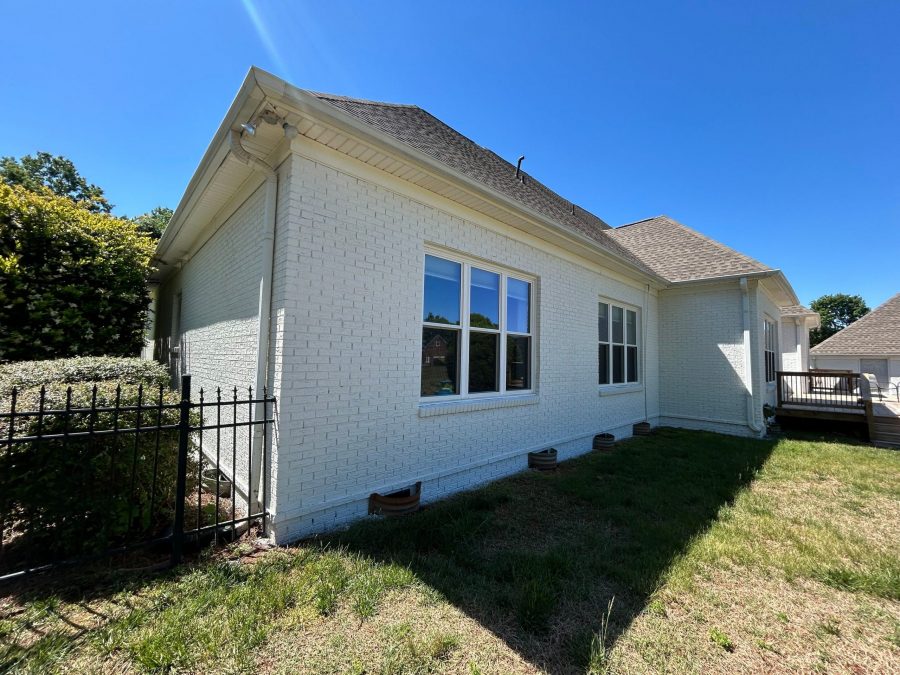 white painted brick home exterior Preview Image 1