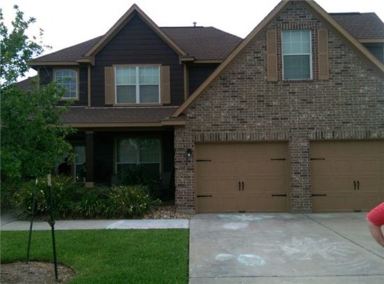 Exterior trim and garage door painting.