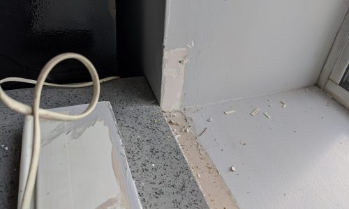 Construction Office Trim During Painting Process