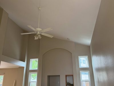 painted home interior room with stained wood trim elements