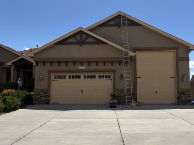 stucco home exterior during repaint
