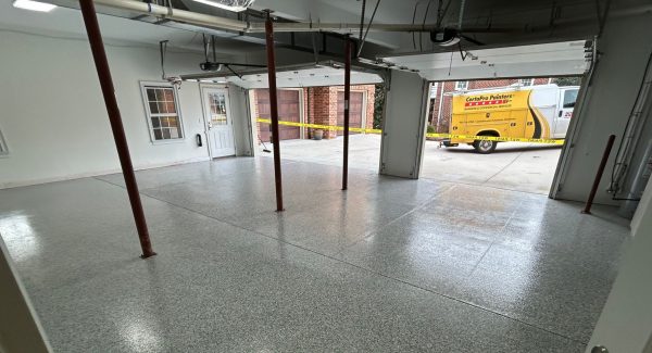 certapro van outside of home garage interior with polyaspartic floor coating
