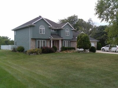 Exterior house painting by CertaPro painters in Bloomington/Normal, IL