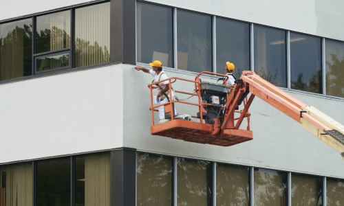 commercial painting in a lift