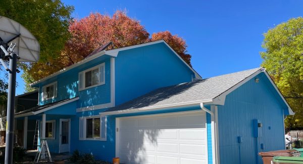 blue house exterior with white trim