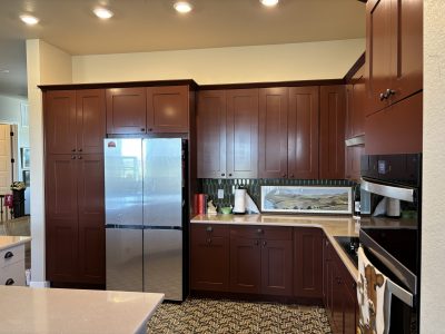 home kitchen with dark painted cabinets