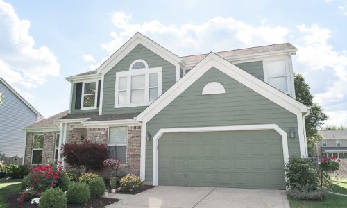Green House With White Trim