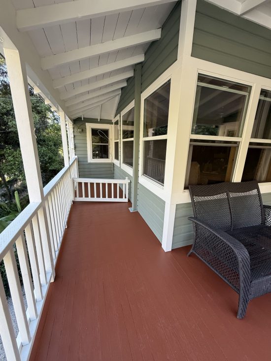 painted upper balcony of home
