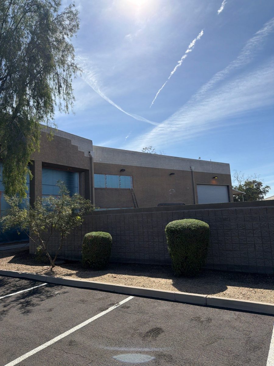 commercial building exterior with worn brick before repaint Preview Image 5