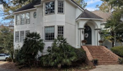 house with white painted stucco exterior